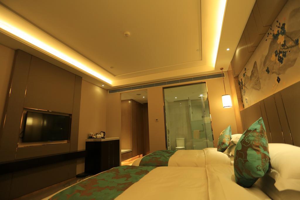 Ramada Yiyang Taojiang Hotel Bagian luar foto