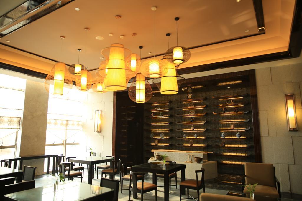 Ramada Yiyang Taojiang Hotel Bagian luar foto